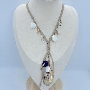 Large leather necklace with mother of pearl charms